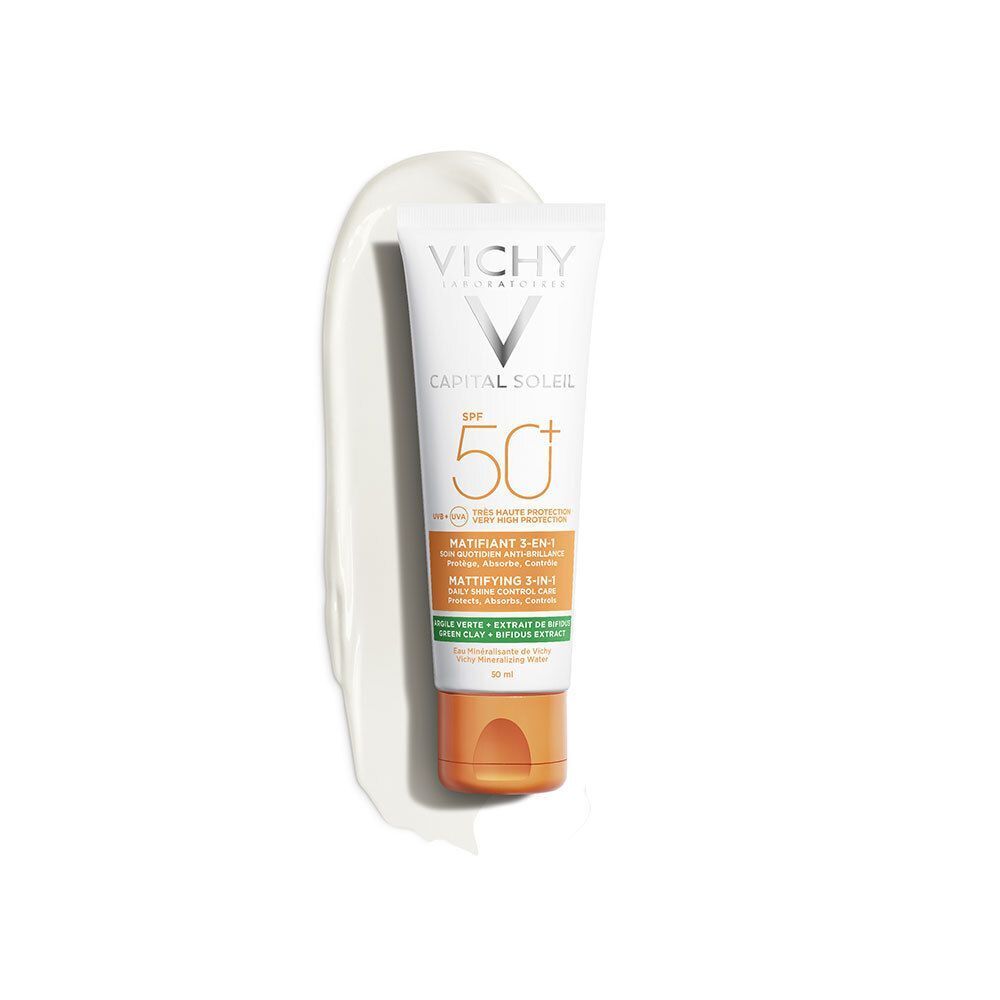 Tube Sonnencreme mit LSF 50+. Weiß, mit grünen und orangen Akzenten. Text.