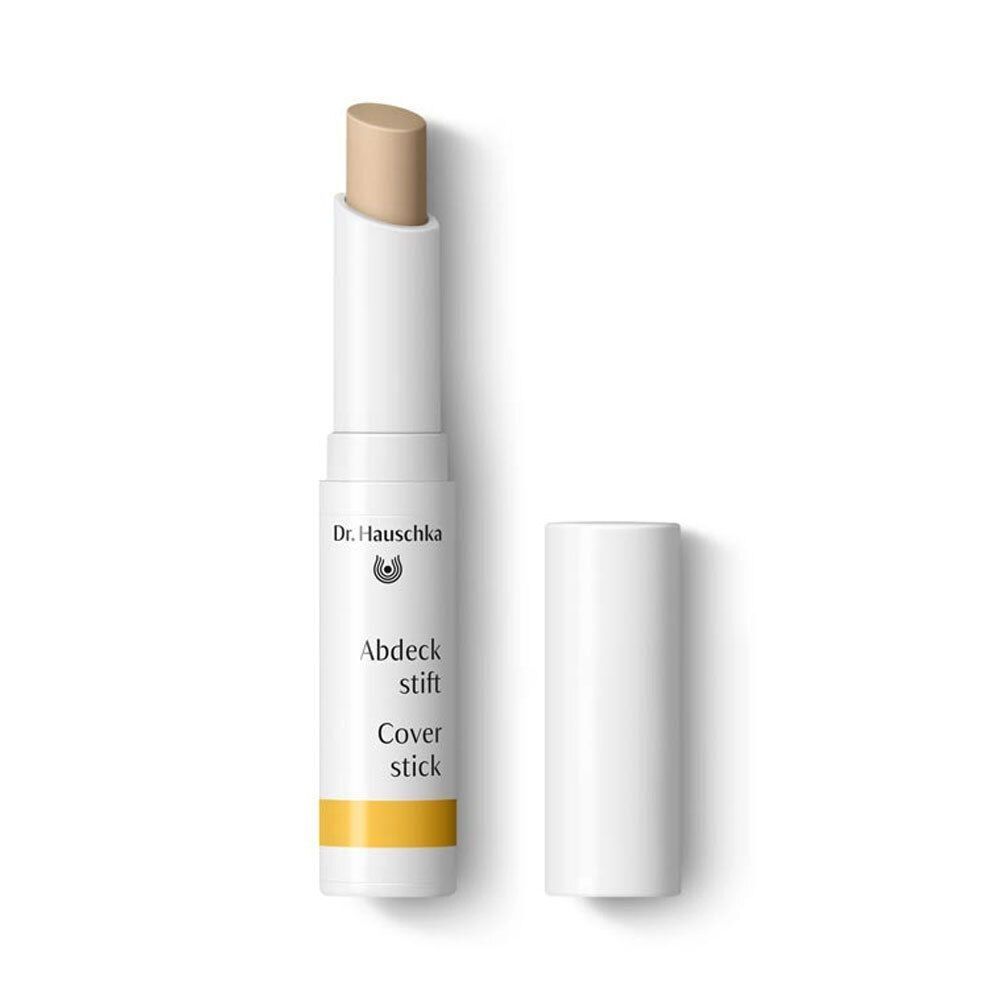 Dr. Hauschka Abdeckstift 02 sand. Weißer Stift mit geöffneter Kappe. Produktname und Beschreibung.
