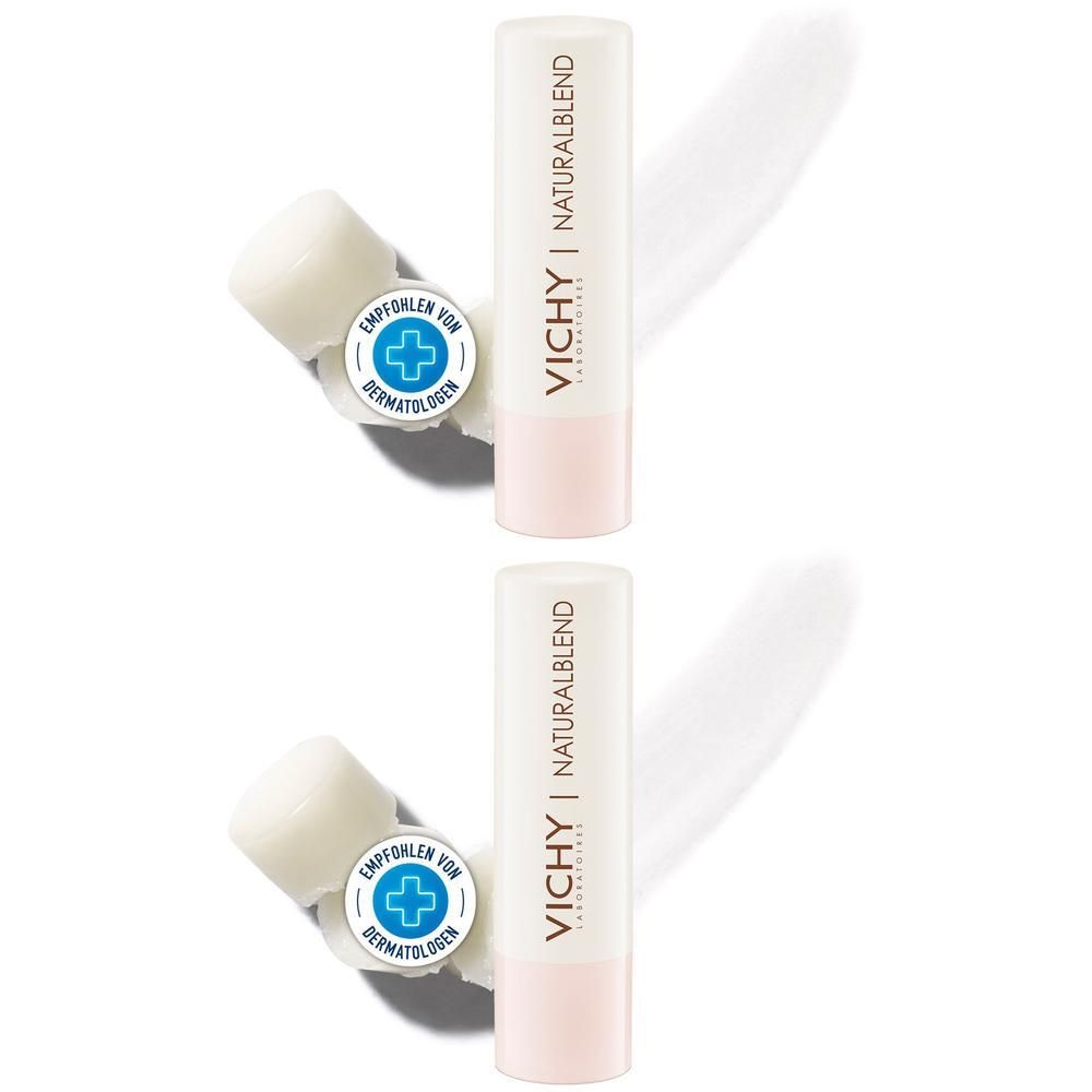 Zwei Lippenbalsam-Stifte. Weißer Stift mit rosa Spitze. Aufschrift: VICHY NATURALBLEND. Empfohlen von Dermatologen.