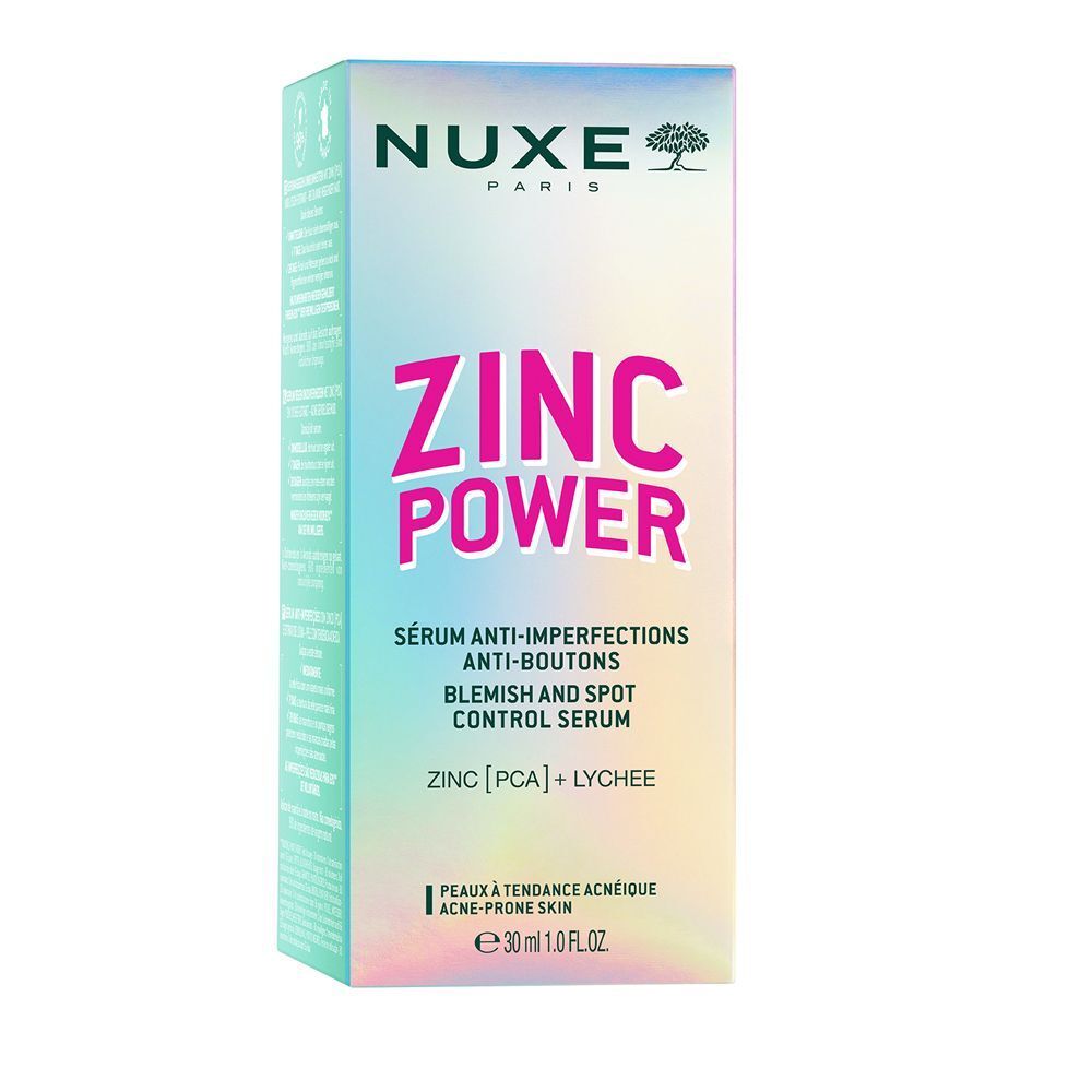 Verpackung von NUXE Zinc Power Serum. Weißer Karton mit türkisfarbenen und pinkfarbenen Elementen. Aufschrift: ZINC POWER, Serum gegen Hautunreinheiten.