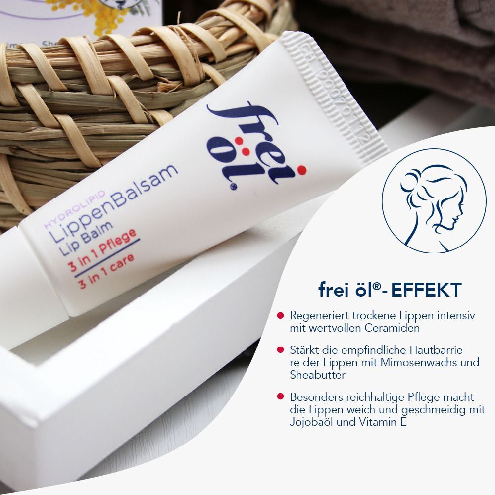 Tube frei öl® HYDROLIPID LippenBalsam in einer Schachtel. Produktname, 3-in-1-Pflege. Grafik einer Frau. Text über Wirkung.