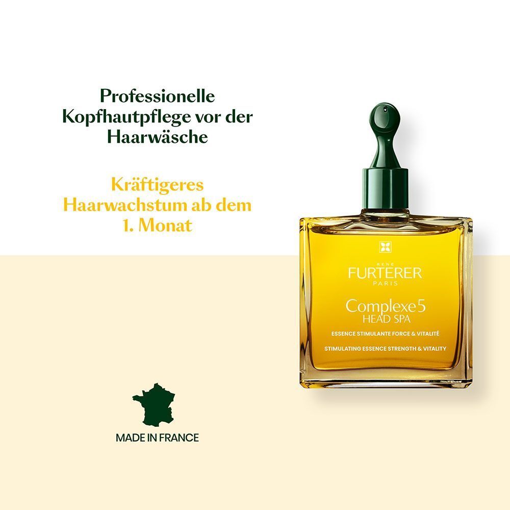 Eine Flasche mit gelber Flüssigkeit und grünem Applikator. Text: Professionelle Kopfhautpflege. Made in France. Schriftzug: FURTERER PARIS.