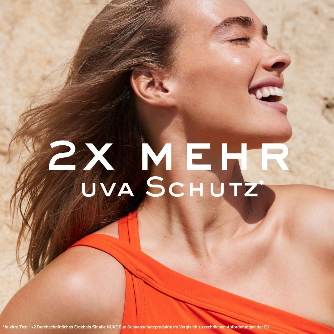 Eine lächelnde Frau im Profil. Text: 2X MEHR UVA SCHUTZ.