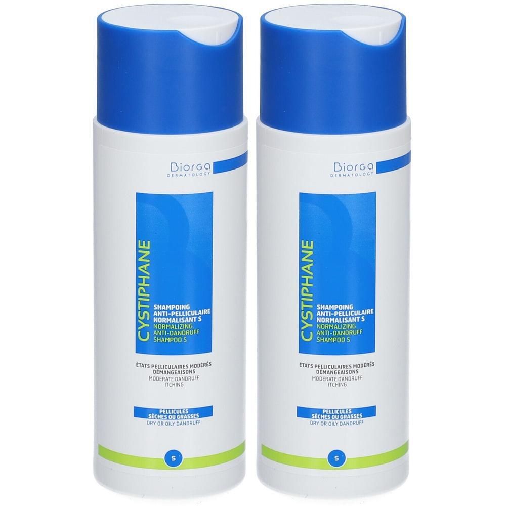 Zwei Flaschen Shampoo mit blauen Deckeln. Aufschrift: CYSTIPHANE, Anti-Schuppen Shampoo. Marke: Biorga.