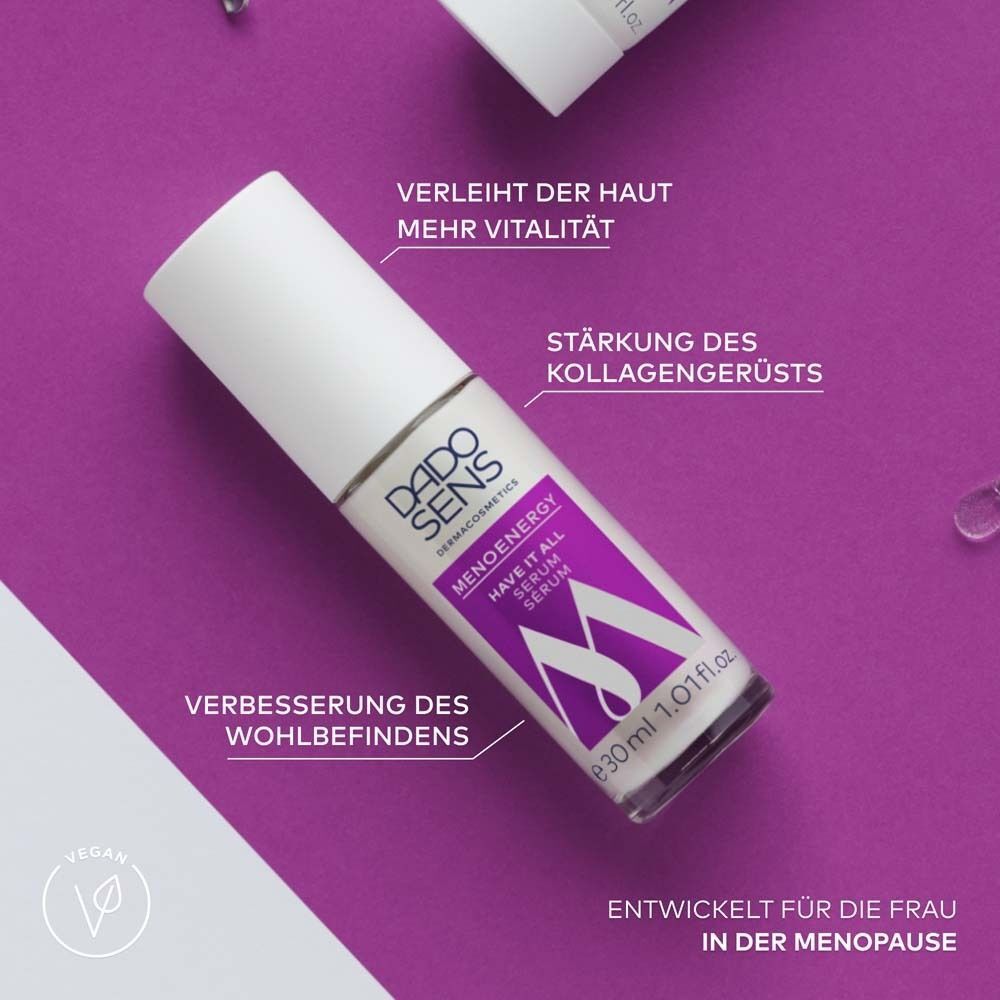 DADO SENS Menoenergy Serum Flasche auf lila Hintergrund. Text: Menoenergy, Have It All Serum. Vegan-Logo.