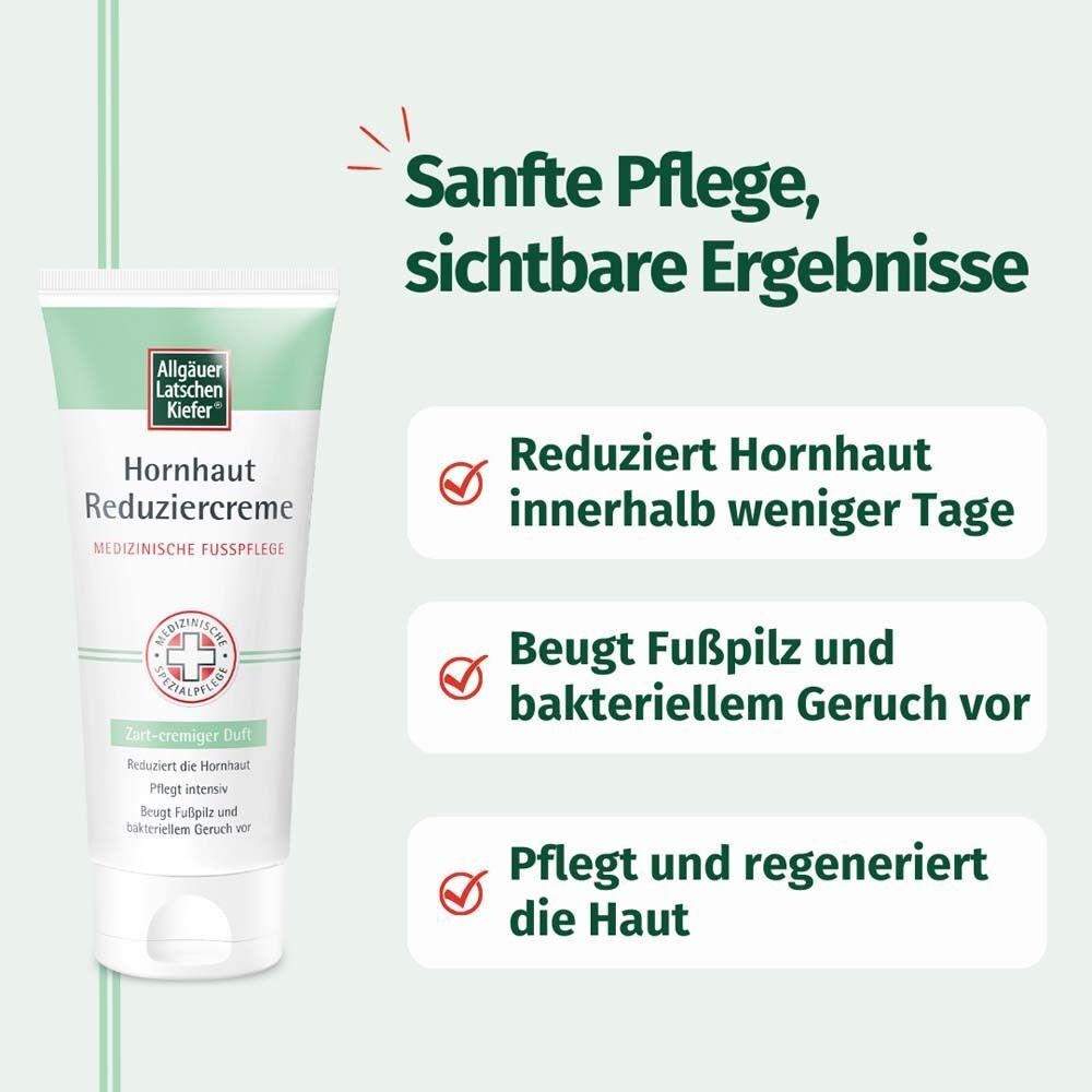 Tube Hornhaut Reduziercreme. Weiß-grüne Verpackung mit Logo und Produktinformationen. Text: Reduziert Hornhaut, beugt Fußpilz vor, pflegt Haut.
