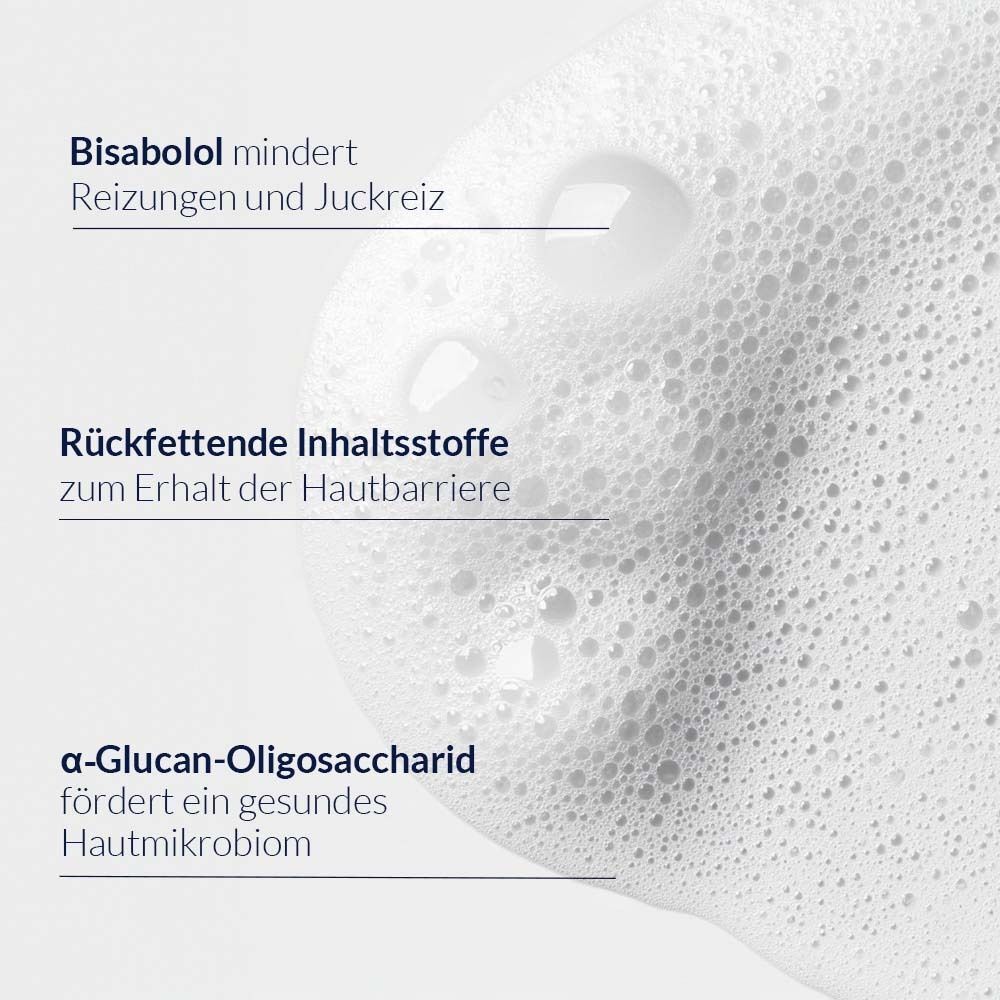 Nahaufnahme von Schaum. Text: Bisabolol mindert Reizungen und Juckreiz. Rückfettende Inhaltsstoffe. α-Glucan-Oligosaccharid.