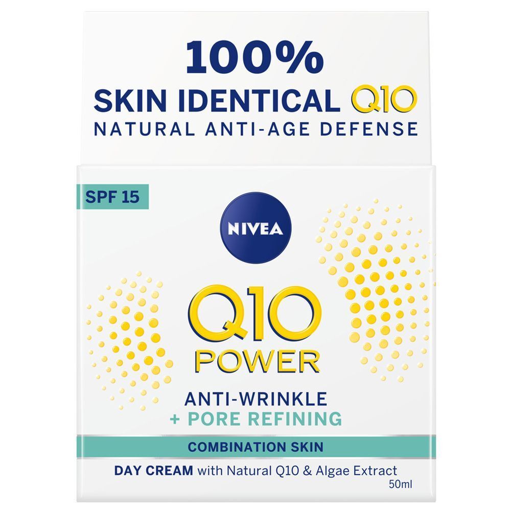 Verpackung NIVEA Q10 Power Tagescreme. Weiße Schachtel mit gelben Punkten und blauen Logos. Aufschrift: Anti-Falten + Porenverfeinerung, Lichtschutzfaktor 15.