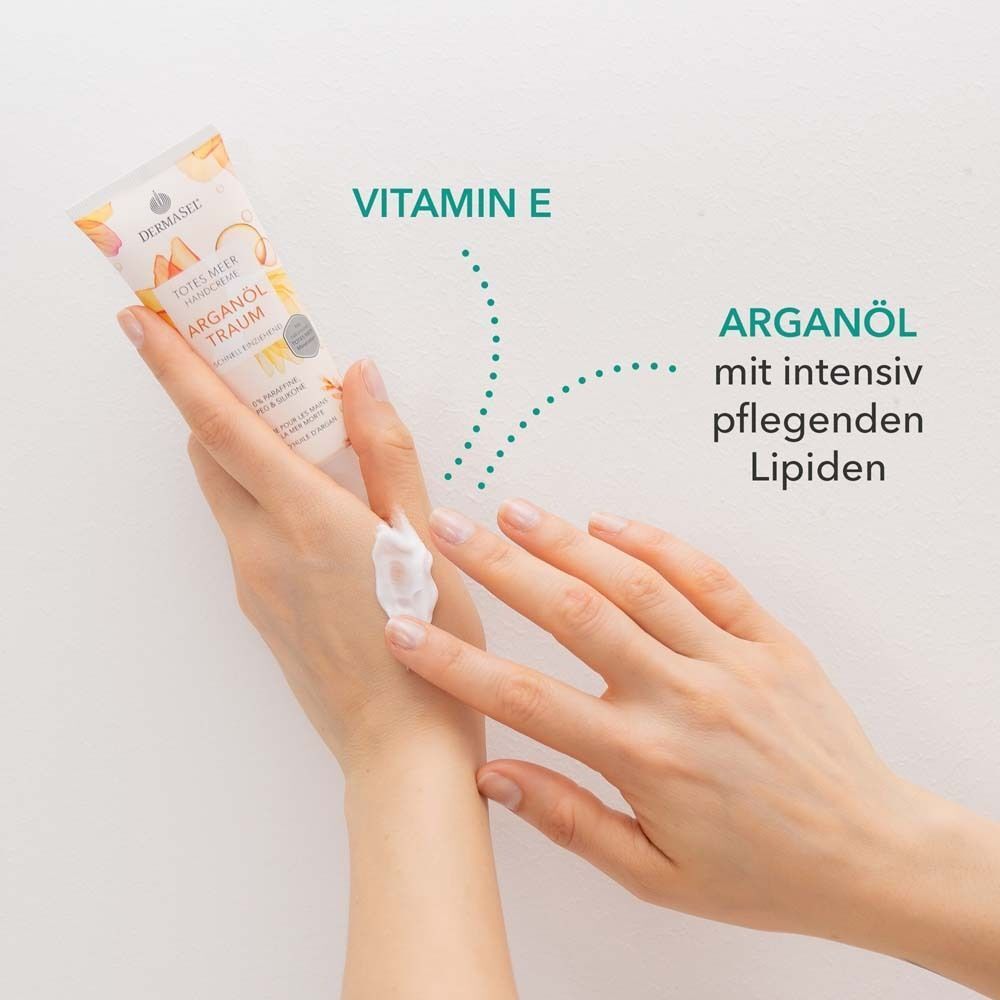 Hände mit Creme. Tube Handcreme sichtbar. Text: Vitamin E, Arganöl mit intensiv pflegenden Lipiden.