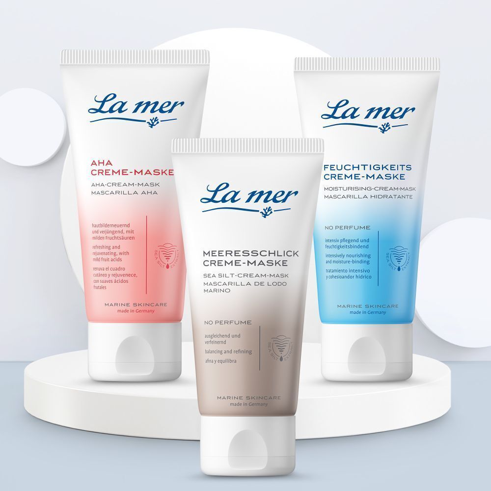 Drei Tuben La mer Creme-Masken. AHA CREME-MASKE, MEERESSCHLICK CREME-MASKE, FEUCHTIGKEITS CREME-MASKE. Auf Podest.