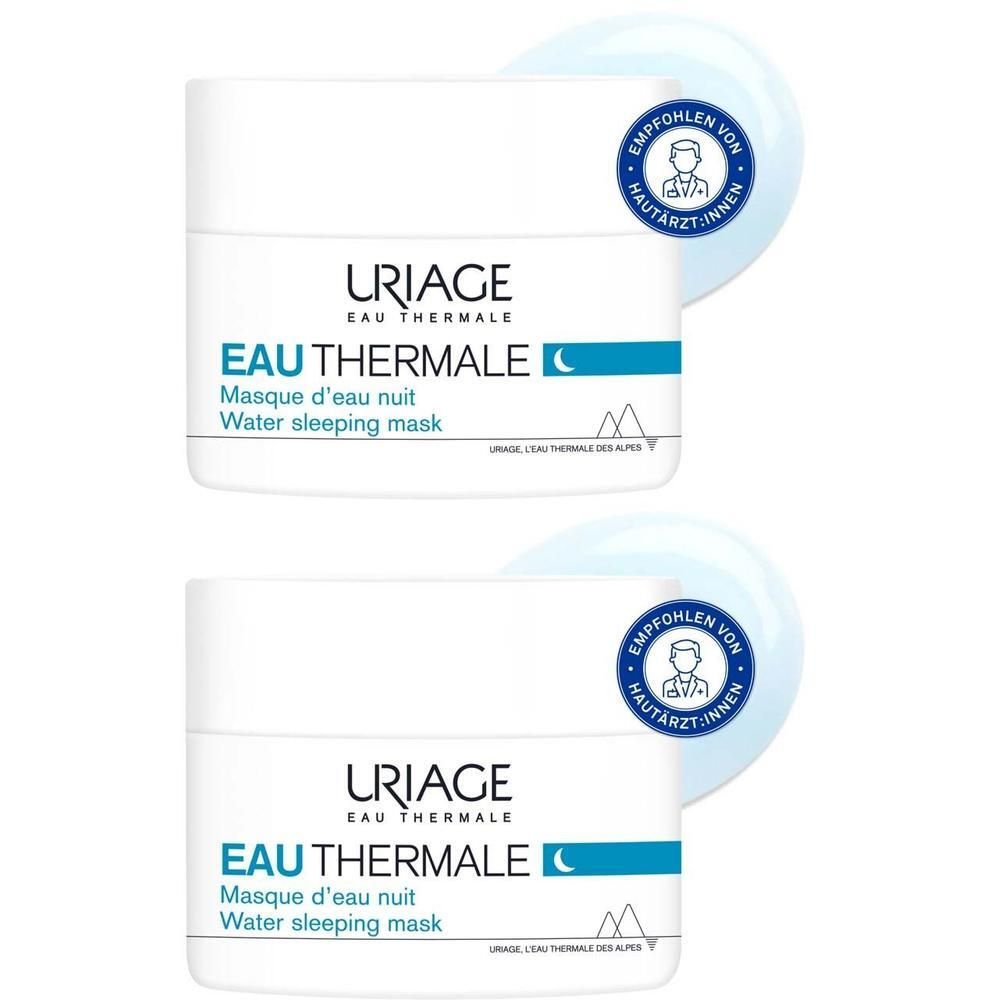 Zwei weiße Tiegel mit blauer Schrift und dem Logo. Aufschrift: URIAGE EAU THERMALE Masque d'eau nuit Water sleeping mask. Mit Siegel.