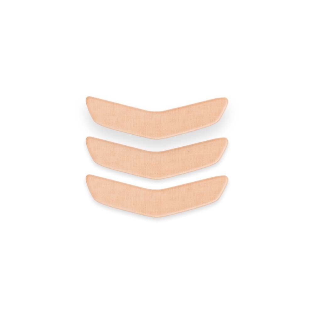 Drei beige, gebogene Mund Patches. Sie sind in einer Reihe angeordnet und haben eine V-Form.