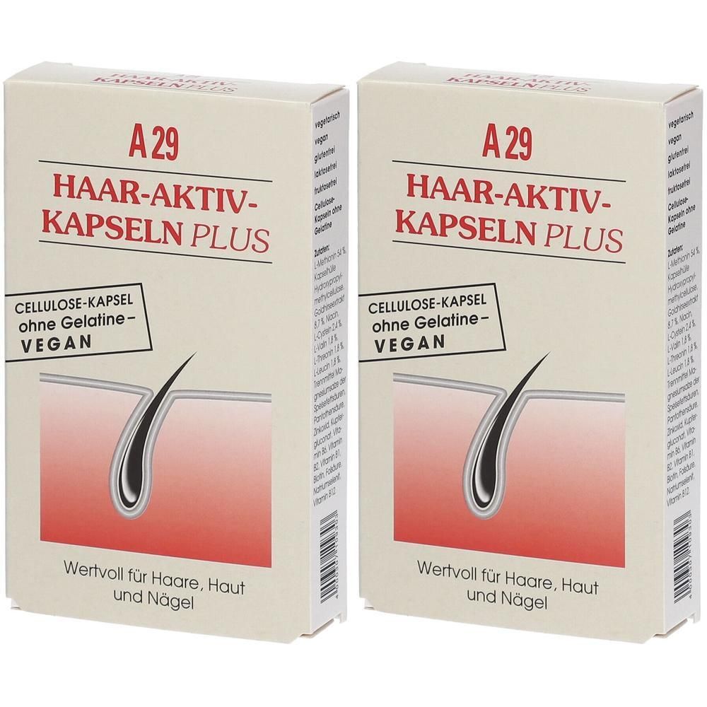 Zwei Kartons mit "A 29 Haar-Aktiv-Kapseln PLUS". Aufschrift: Cellulose-Kapsel ohne Gelatine-vegan. Wertvoll für Haare, Haut und Nägel.