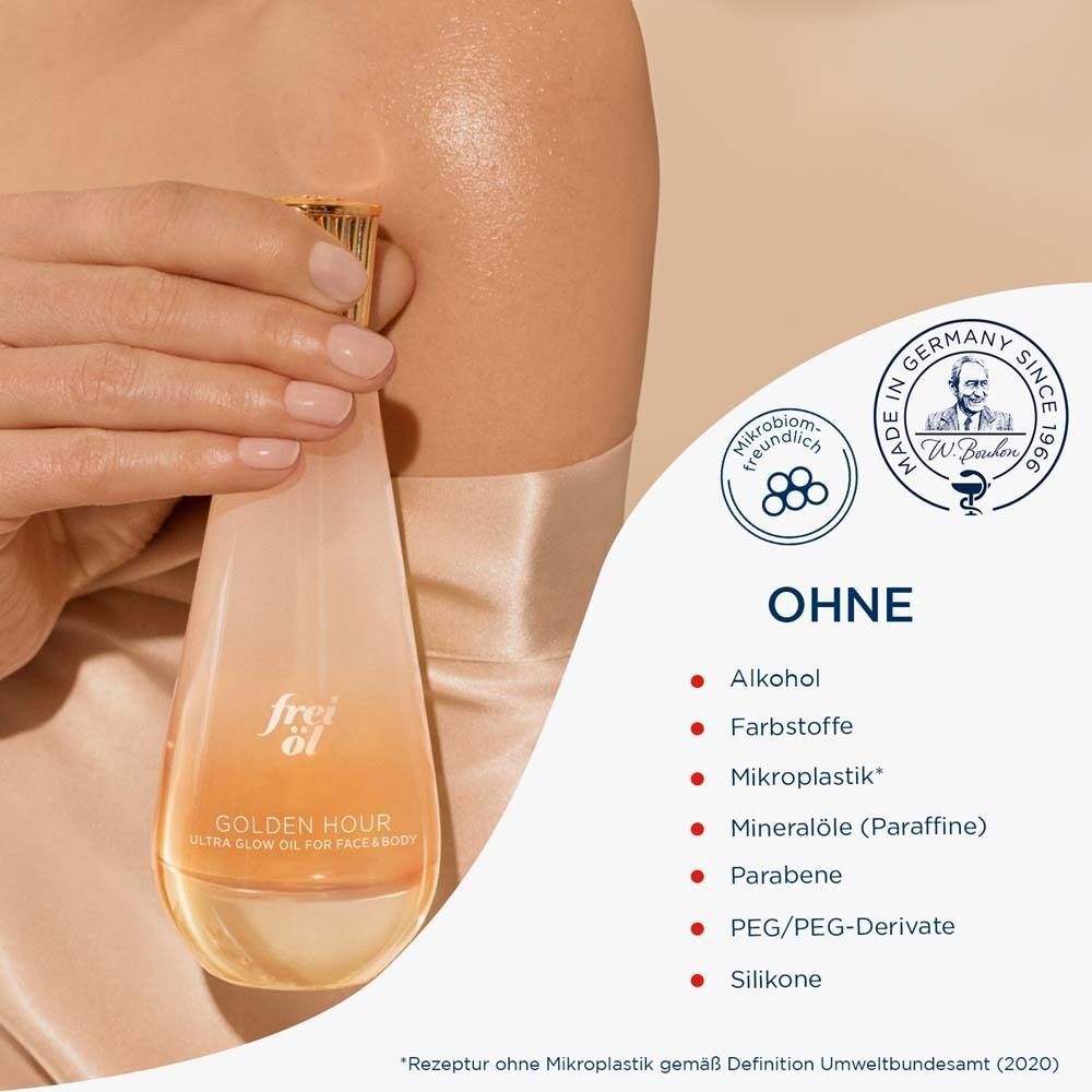 Flasche frei öl® ULTRA GLOW ÖL Golden Hour. Text über 'OHNE' Inhaltsstoffe. Logos 'Mikrobiomfreundlich' und 'Made in Germany'.