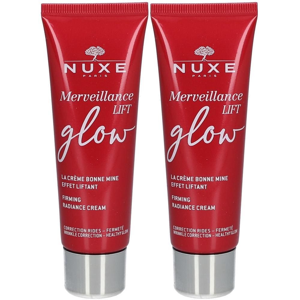Zwei rote Tuben mit silbernen Verschlüssen. Auf jeder Tube steht "NUXE Merveillance Lift glow" und weitere Produktinformationen.