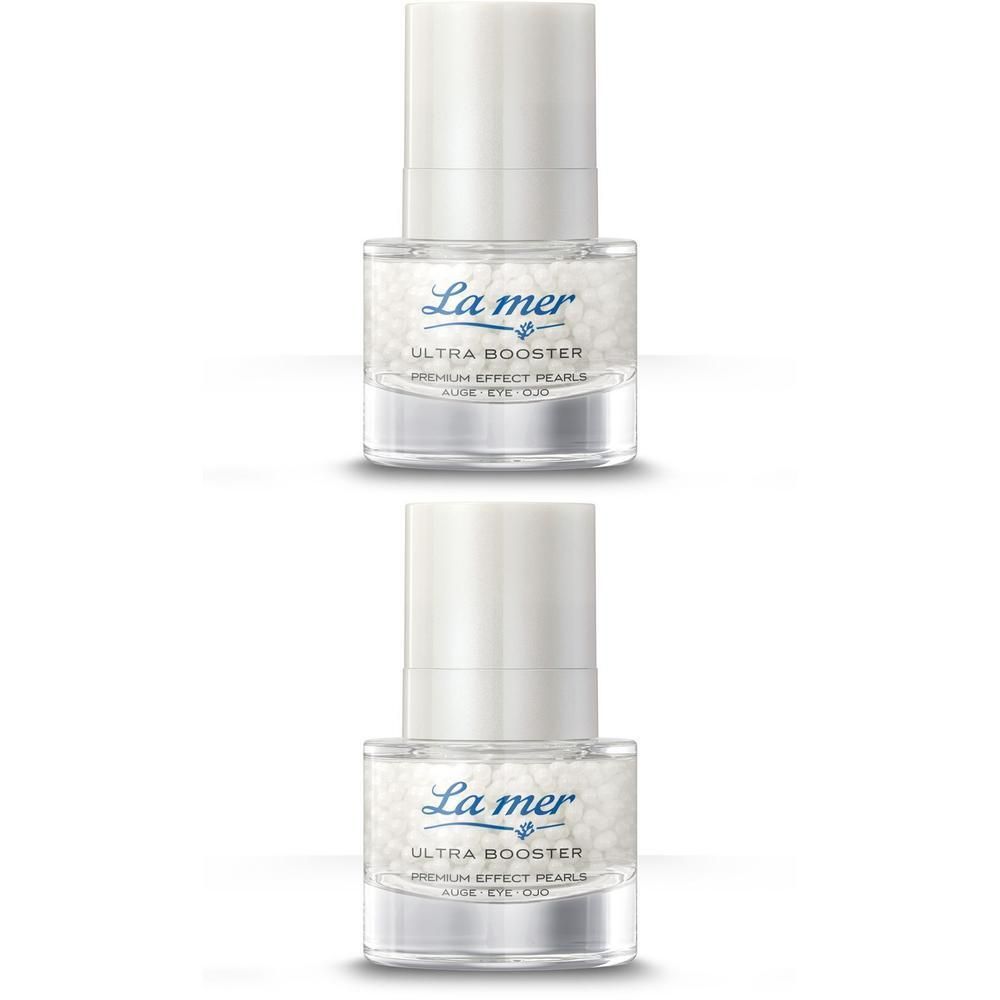 Zwei Flakons La mer Ultra Booster Premium Effect Pearls Auge. Glasflakons mit weißen Perlen und weißem Deckel.