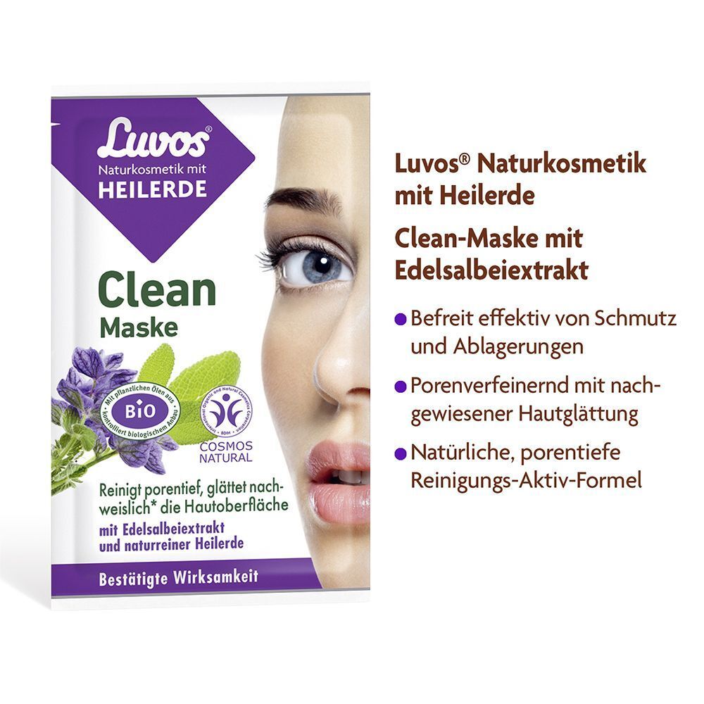 LUVOS Clean-Maske Packung. Lila Verpackung mit Logo und Text. ÖKO-TEST Siegel. Teilansicht eines Gesichts. Text daneben.