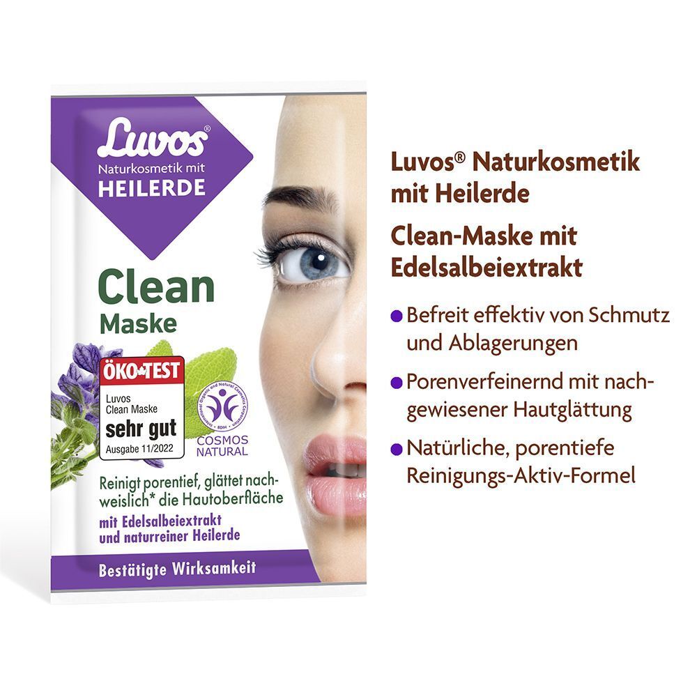 LUVOS Clean-Maske Packung. Lila Verpackung mit Logo und Text. ÖKO-TEST Siegel. Teilansicht eines Gesichts. Text daneben.