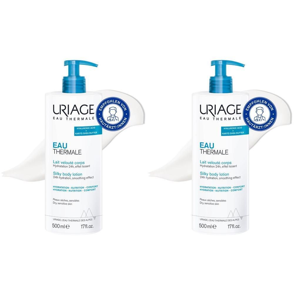 Zwei Flaschen Uriage Eau Thermale Körpermilch mit blauem Pumpverschluss. Aufkleber mit Produktinformationen und Logo.