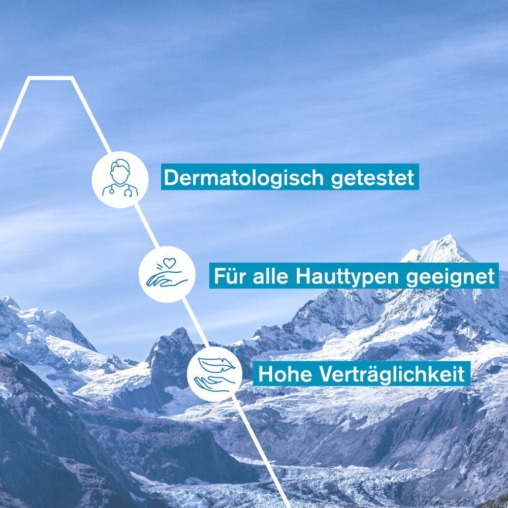 Grafik mit Text: Dermatologisch getestet, für alle Hauttypen geeignet, hohe Verträglichkeit. Hintergrund: Berge.