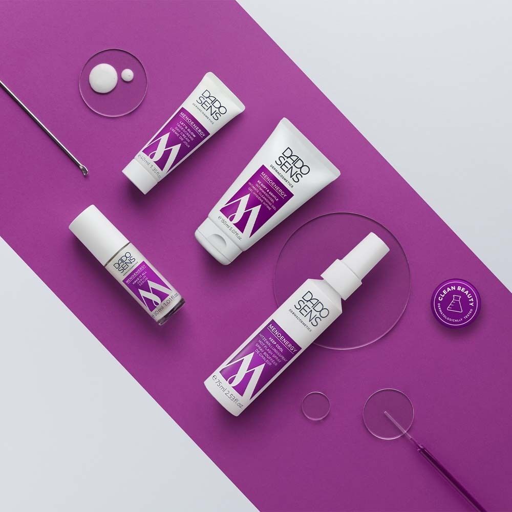 DADOSENS Produkte auf lila Untergrund. Nachtcreme, Tagescreme, Spray. Weiße Tuben und Flaschen mit lila Schrift.