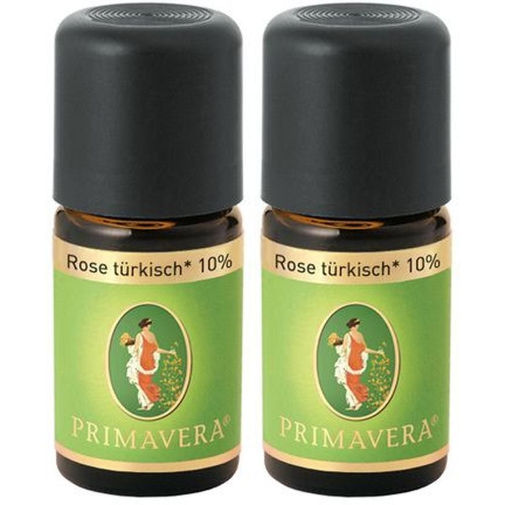 Zwei kleine Glasflaschen mit schwarzem Deckel. Aufschrift: Rose türkisch* 10%. Logo mit Frau. Marke: PRIMAVERA.