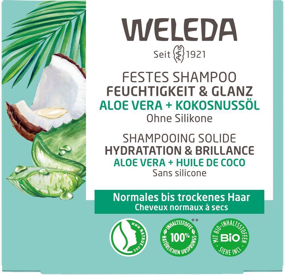 Nahaufnahme der Produktverpackung. Türkisfarbener Karton mit Produktinformationen und Illustrationen von Kokosnuss und Aloe Vera.