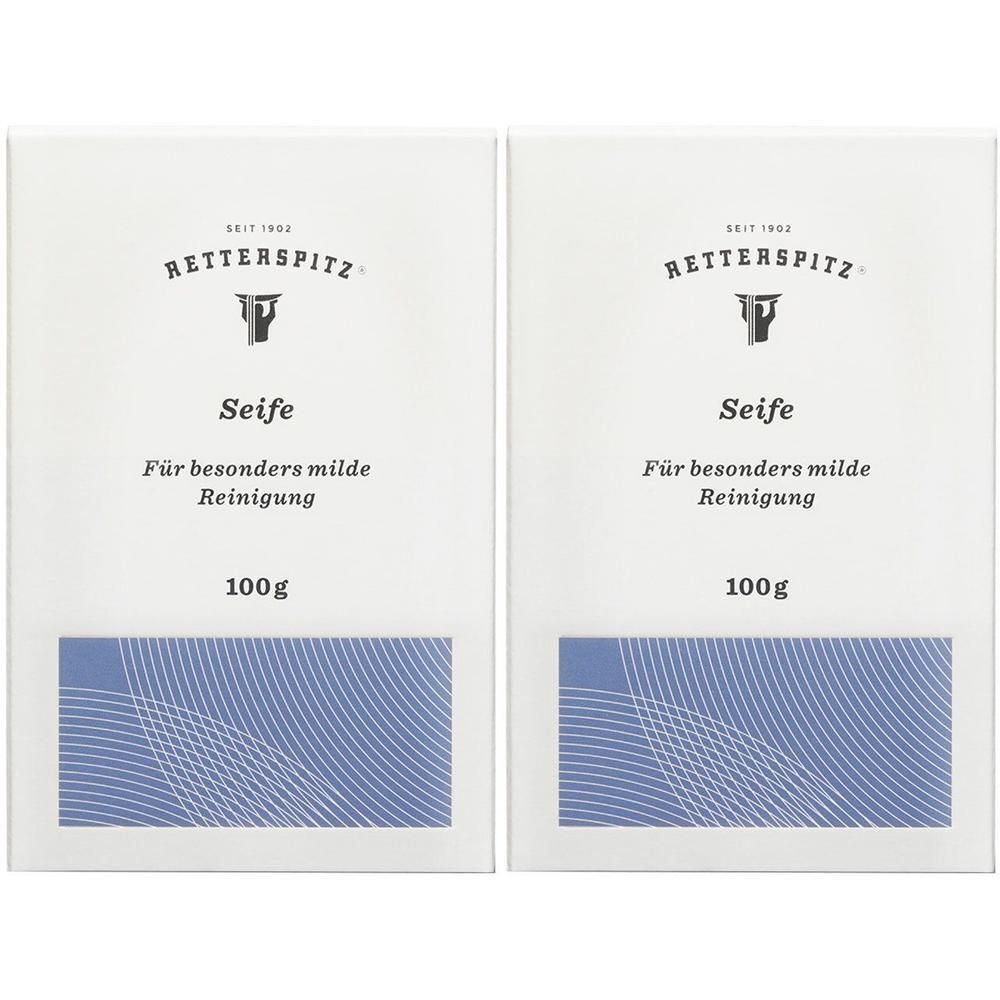 Zwei weiße Seifenverpackungen mit blauem Feld. RETTERSPITZ Logo und Schriftzug "Seife". Text: "Für besonders milde Reinigung".