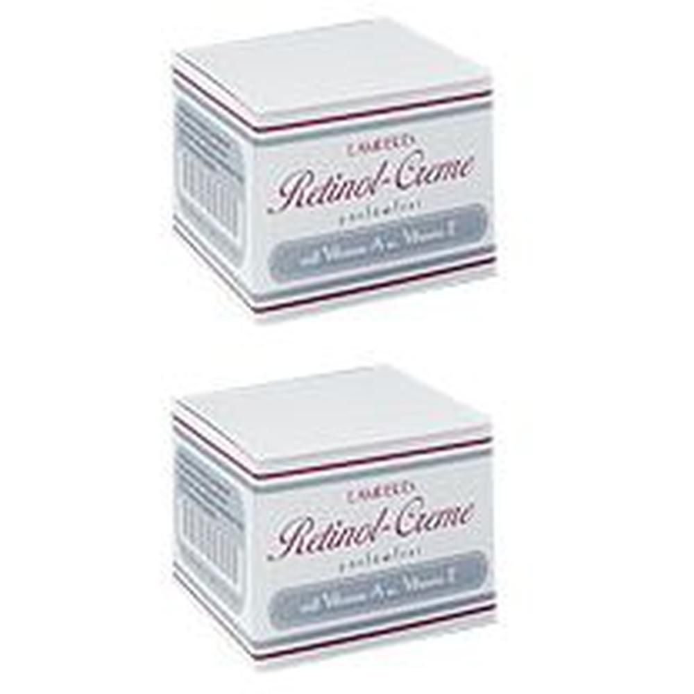 Zwei quadratische Cremetiegel mit weißer Verpackung. Aufschrift: Retinol-Creme parfümfrei mit Vitamin A+E.