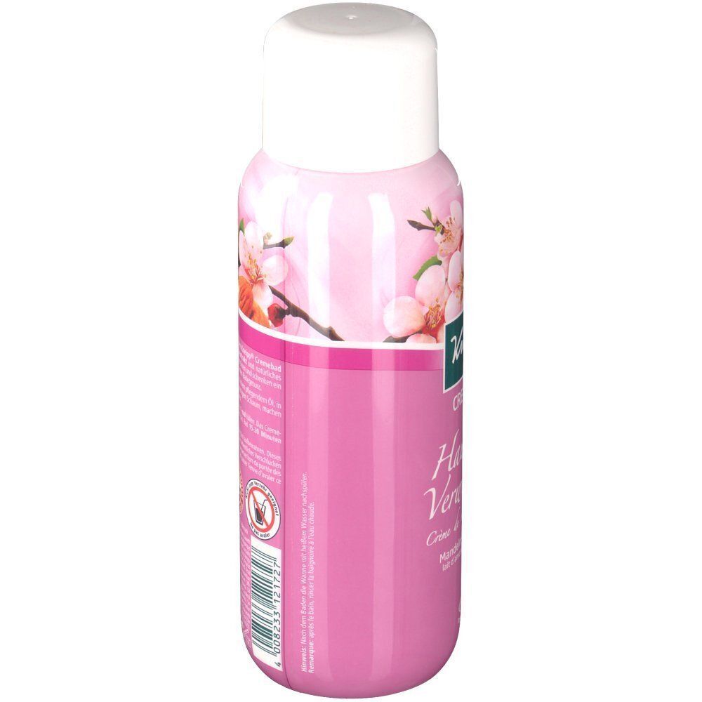Seite einer rosa Flasche Cremebad mit weißem Deckel. Text: Kneipp, Cremebad Hautzarte Verwöhnung, Blüten-Design.