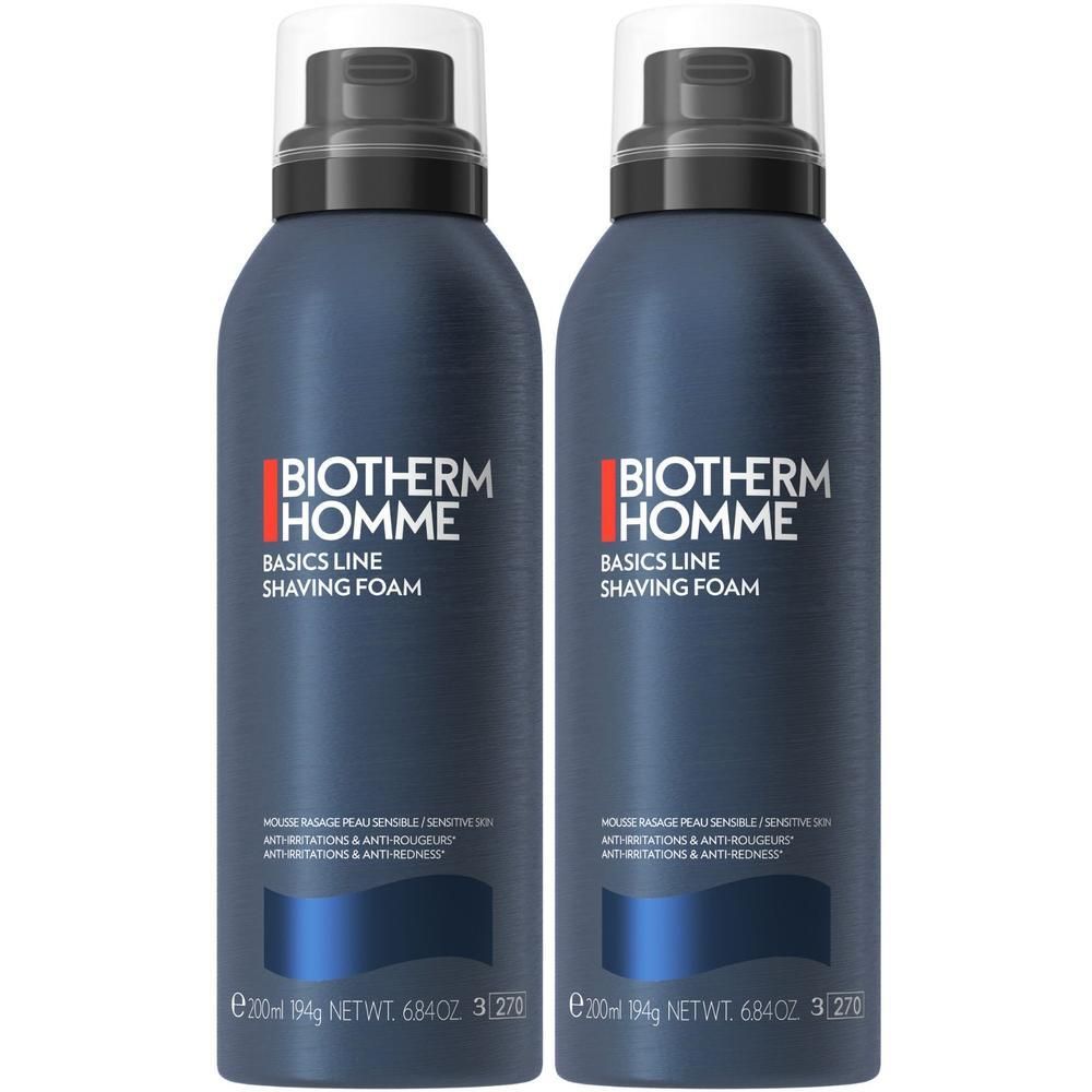 Zwei blaue Sprühdosen mit schwarzem Deckel. Aufschrift: BIOTHERM HOMME, BASICS LINE SHAVING FOAM. Text darunter.