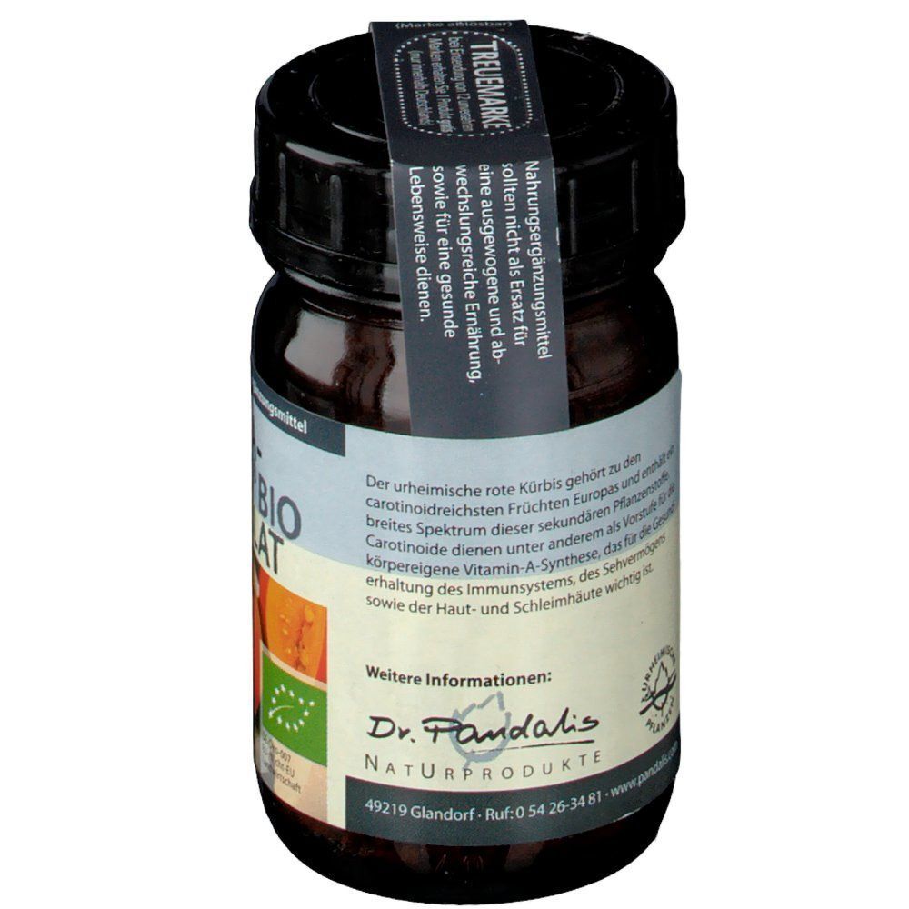 Braunes Glas Carotakürbis Bio Granulat. Schwarzer Deckel und Etikett. Aufdruck: Dr. Pandalis Naturprodukte, Bio-Siegel.