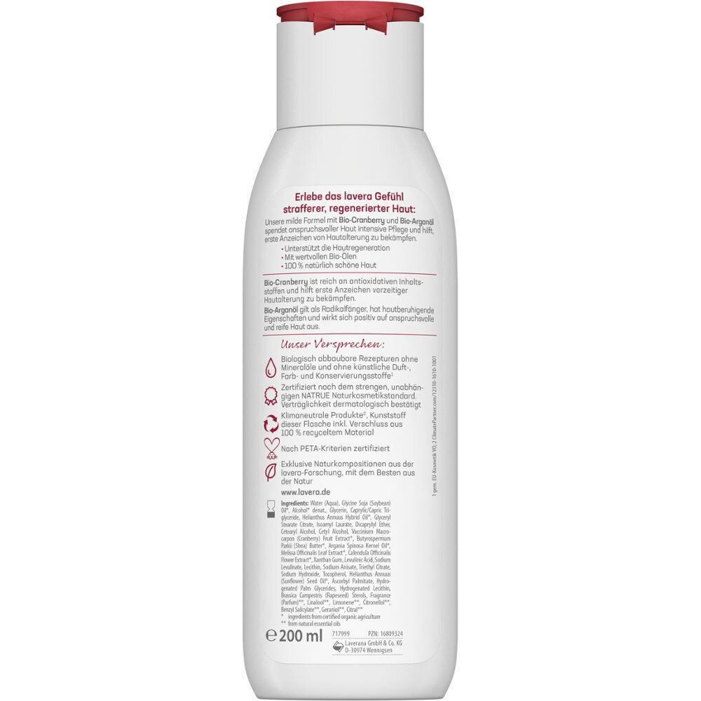 Weiße Flasche mit rotem Deckel. Rückseite mit Text. Aufschrift: lavera. Bio-Cranberry & Bio-Arganöl. Vegan. Klimaneutral. 200 ml.