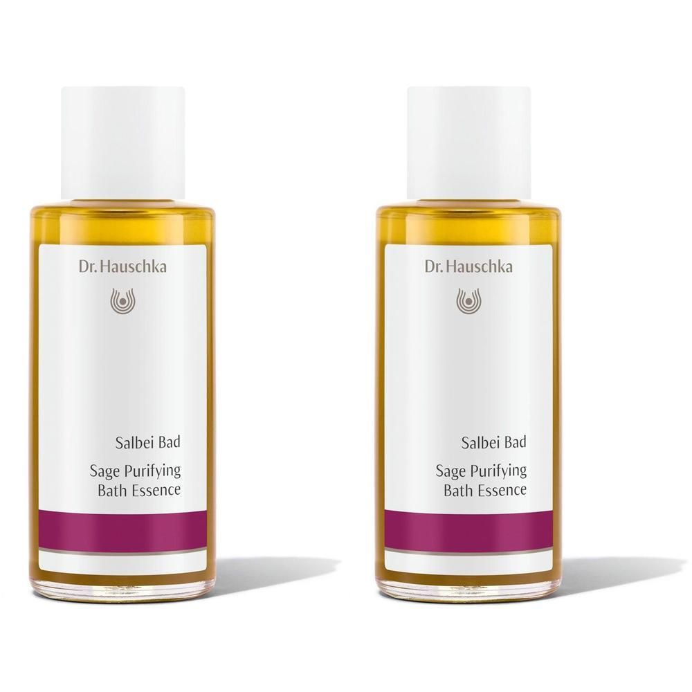 Zwei Flaschen Dr. Hauschka Salbei Bad, eine klare gelbe Flüssigkeit mit weißem Etikett und violetter Banderole.