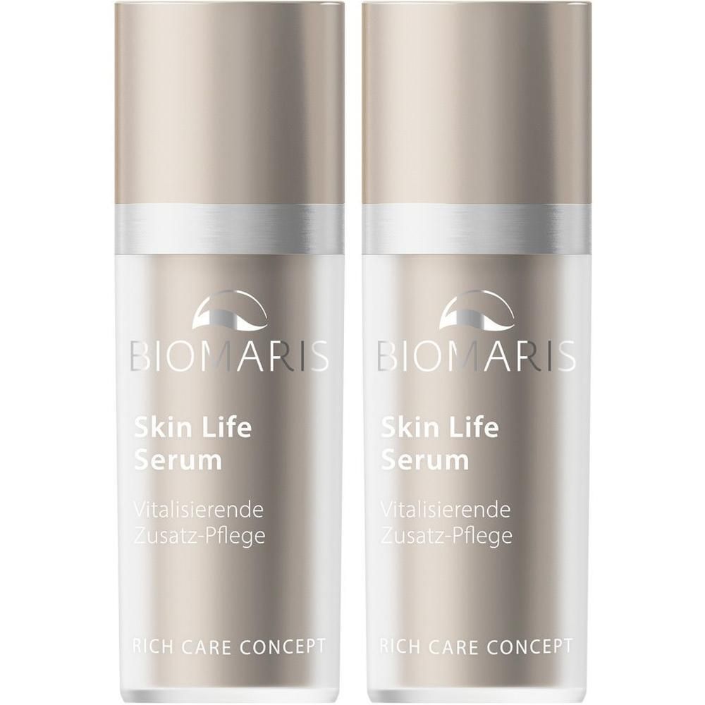 Zwei Flakons BIOMARIS Skin Life Serum. Beige-farbene Pumpflaschen mit silbernem Deckel. Produktbezeichnung und Marke sichtbar.