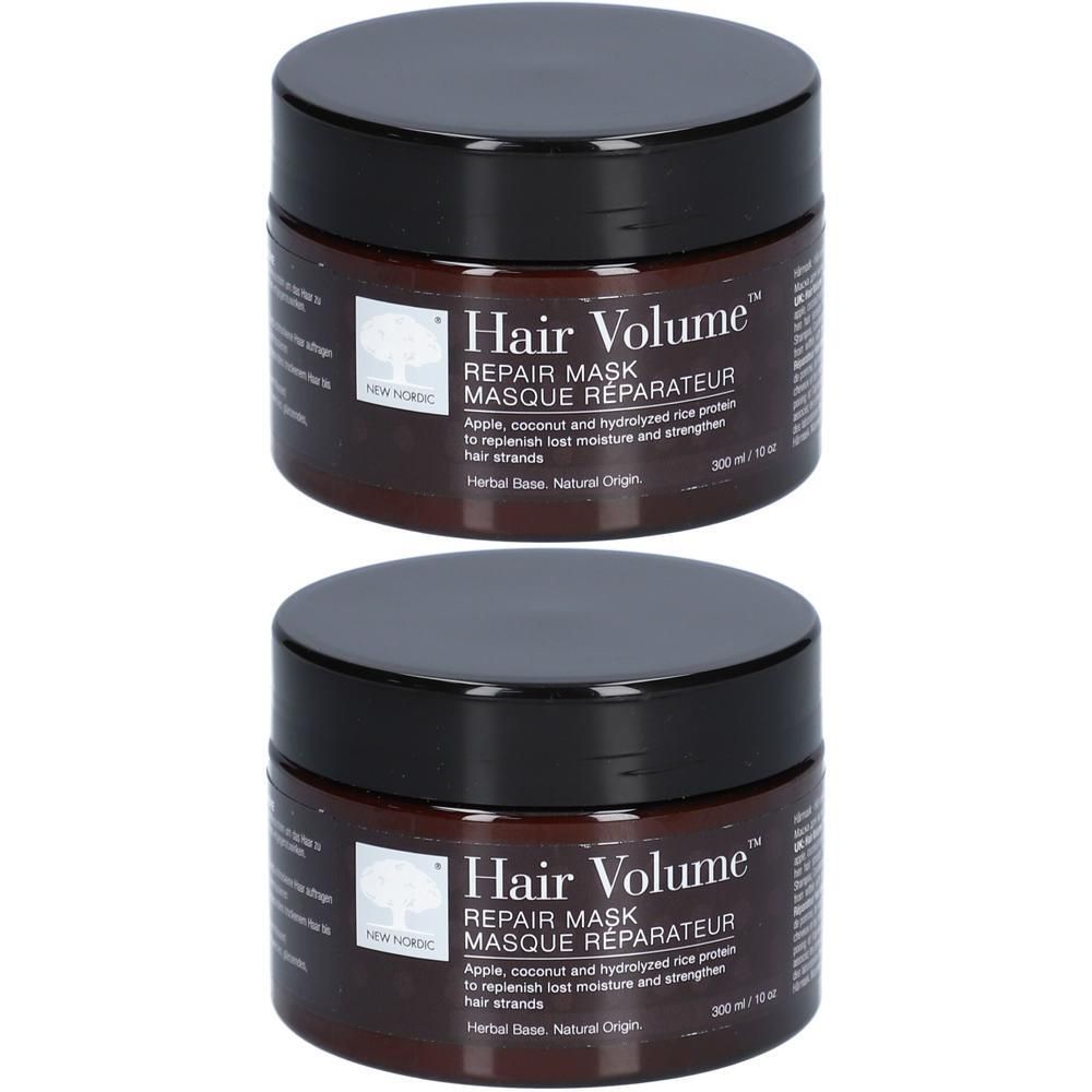 Zwei braune Tiegel mit schwarzem Deckel. Aufschrift: Hair Volume Repair Mask. Text in Englisch und Französisch.