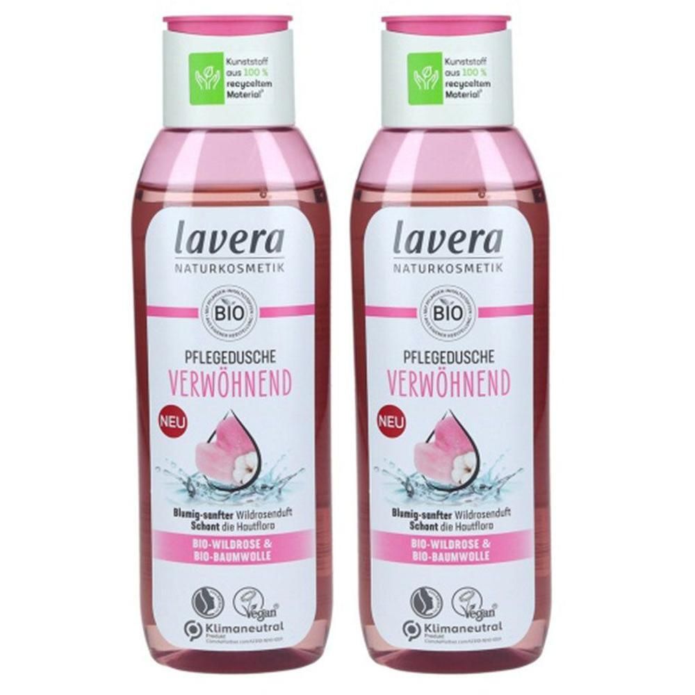 Zwei Flaschen lavera Pflegedusche VERWÖHNEND. Rosa Flüssigkeit in durchsichtigen Flaschen. Aufschrift: BIO, Vegan, Klimaneutral.