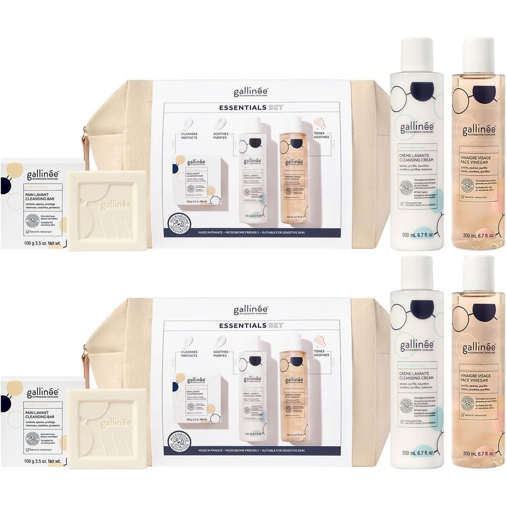 Set mit Reinigungsprodukten und Seife. Enthält zwei Flaschen, eine Seife und eine Kosmetiktasche. Aufschrift: GA ESSENTIALS SET.