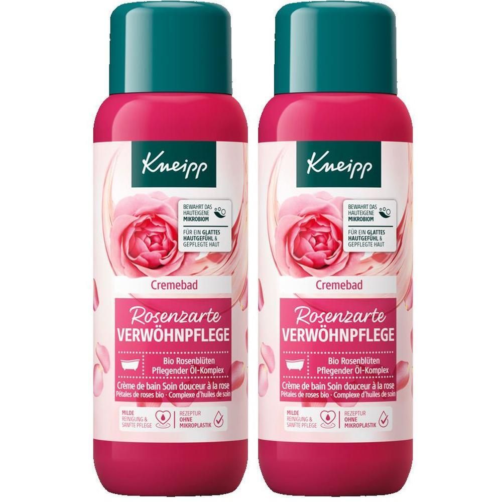 Zwei Flaschen Cremebad. Rosa Flaschen mit grünen Deckeln. Aufschrift: Kneipp, Cremebad, Rosenzarte Verwöhnpflege. Abbildung einer Rose.