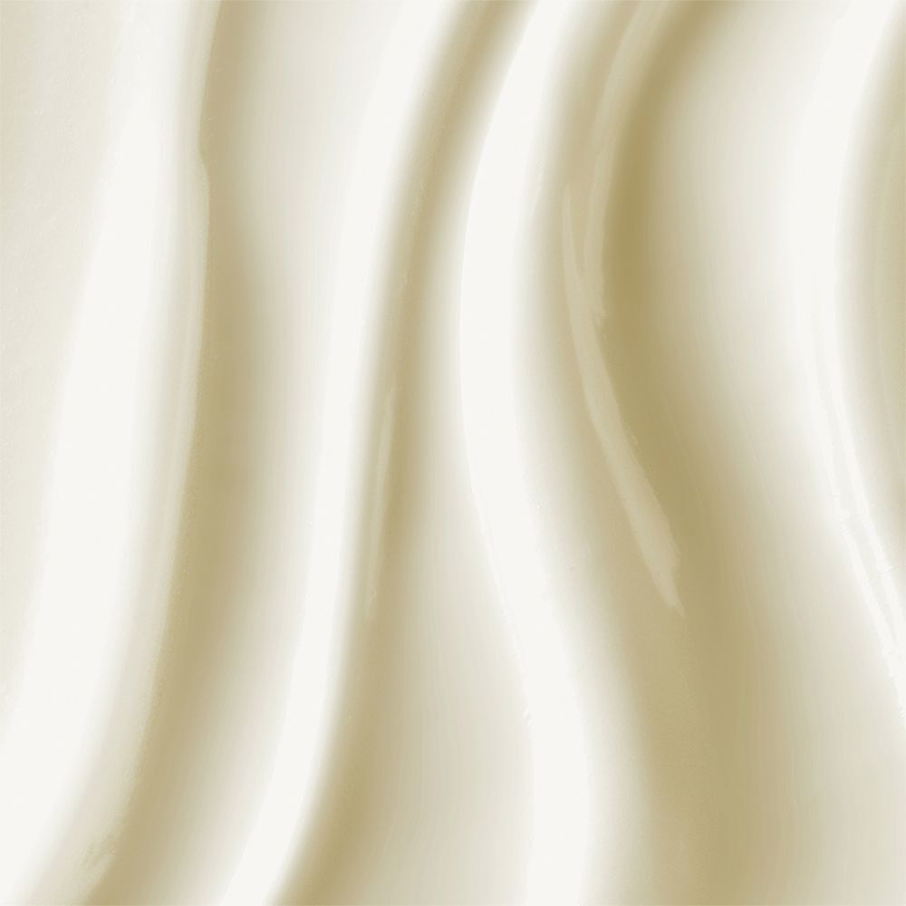 Nahaufnahme von weißer Sonnencreme. Wellenförmige Textur.