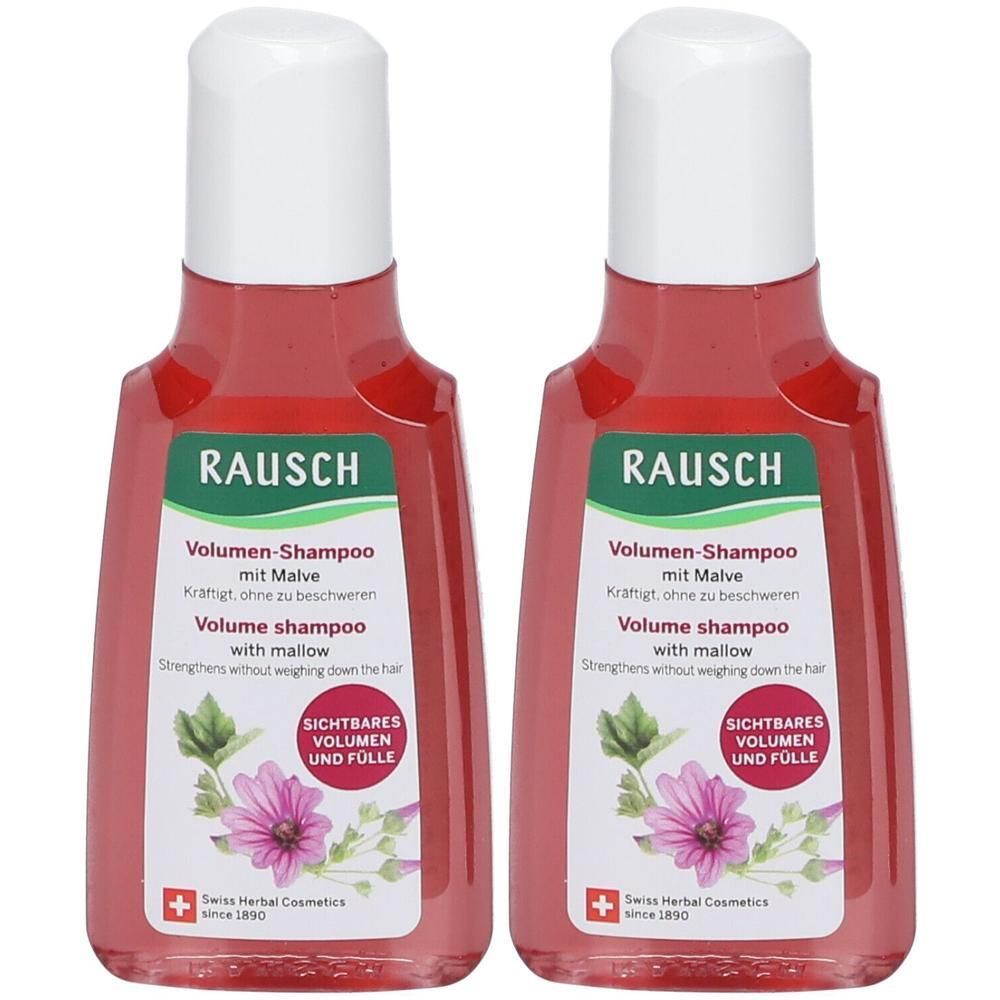 Zwei Flaschen Volumen-Shampoo mit Malve. Rote Flüssigkeit in durchsichtigen Flaschen mit weißem Deckel. Aufschrift: RAUSCH, Volumen-Shampoo.