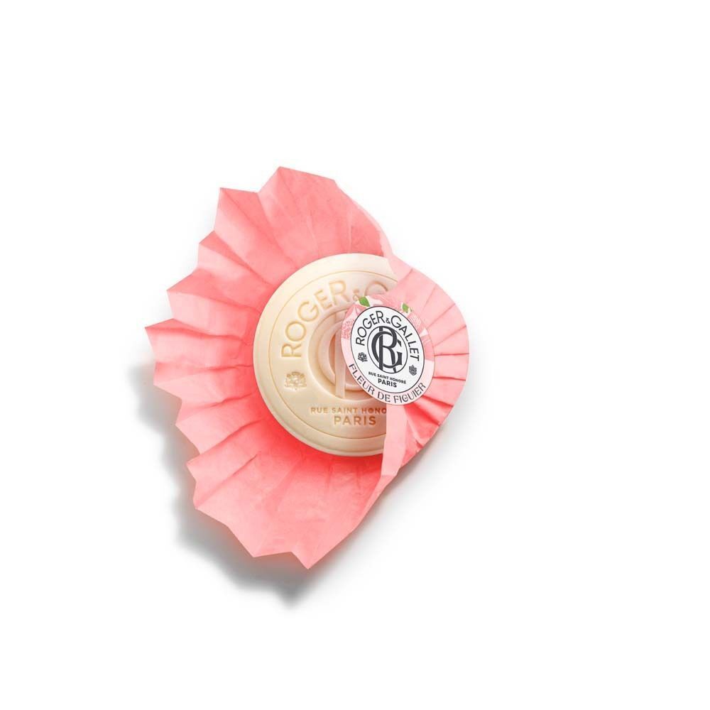 Runde Seife in rosa Papierverpackung. Aufdruck: Roger & Gallet, Fleur de Figuier.