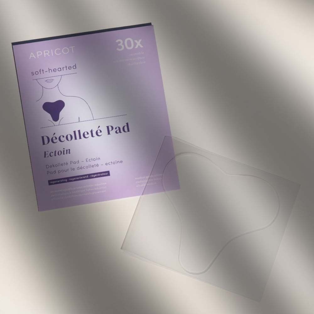 Verpackung und Pad. Aufschrift: APRICOT, Décolleté Pad Ectoin. Transparentes Pad daneben.