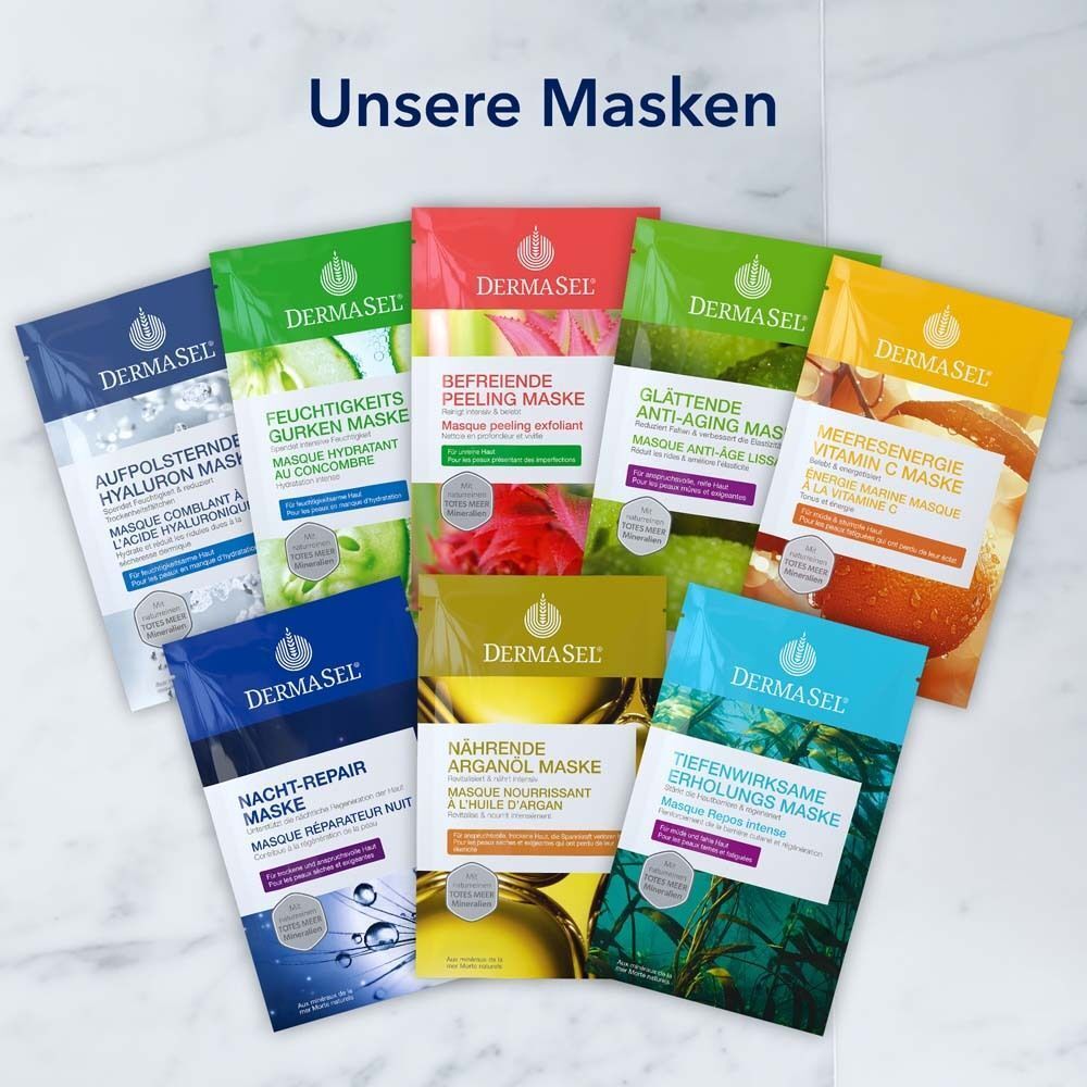 Verschiedene DERMASEL Masken in Einzelverpackungen. Mehrere Farben und Produktbezeichnungen.