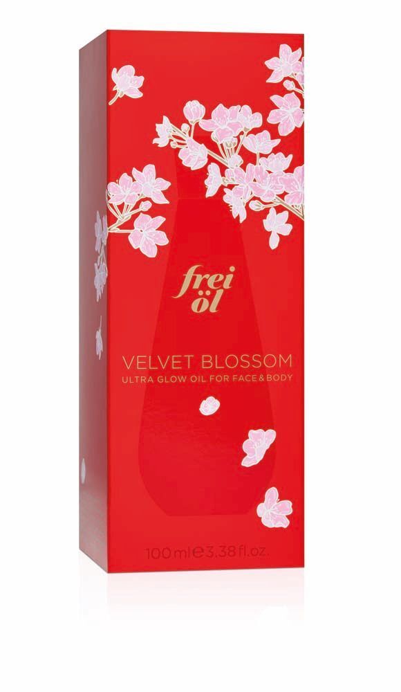 Rote Verpackung von frei öl® ULTRA GLOW ÖL Velvet Blossom. Mit Blütenmuster und Produktinformationen.