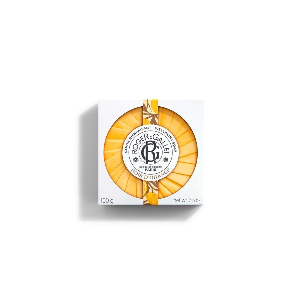Quadratische Verpackung mit runder, gelber Seife. Auf der Verpackung steht "Roger & Gallet" und "Bois d'Orange".
