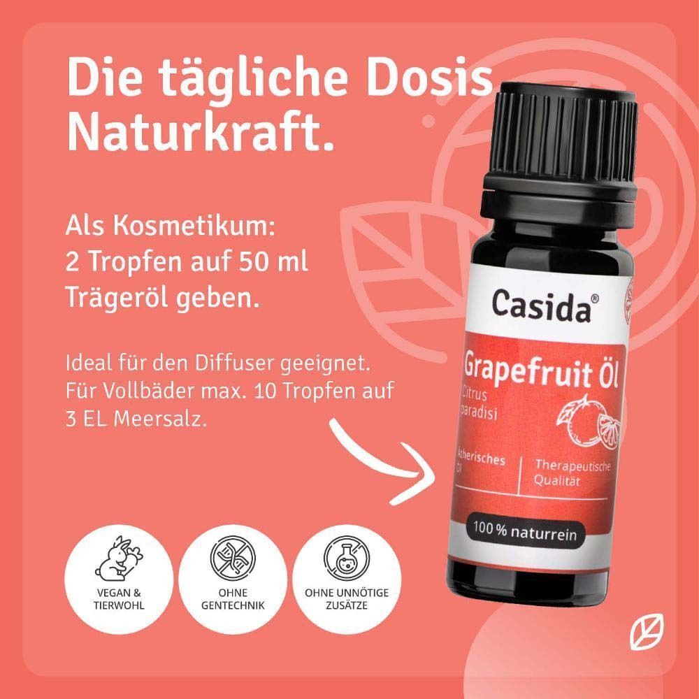 Flasche Casida® Grapefruit Öl. Schwarze Kappe, weißes Etikett mit rotem Band. Text: Grapefruit Öl, Citrus paradisi, therapeutische Qualität. Icons: vegan, ohne Gentechnik.