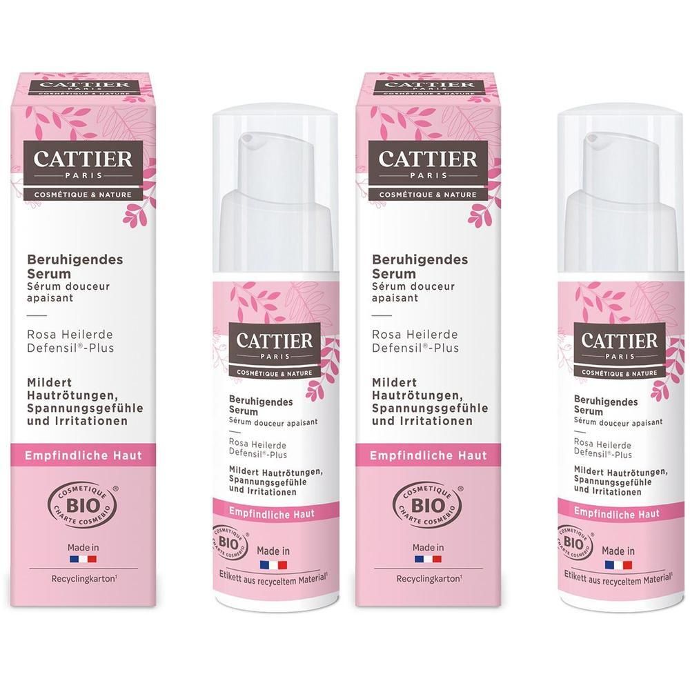 Vier Flaschen Serum mit rosa Verpackung. Aufschrift: CATTIER, Beruhigendes Serum, Rosa Heilerde, Defensil®-Plus. Bio-Zertifizierung.