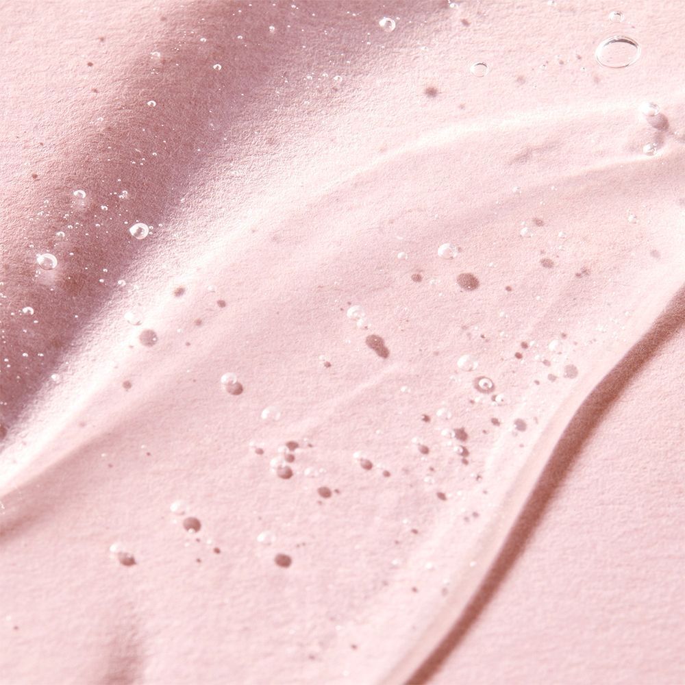 Nahaufnahme von rosa Gel mit Bläschen. Hintergrund rosa.