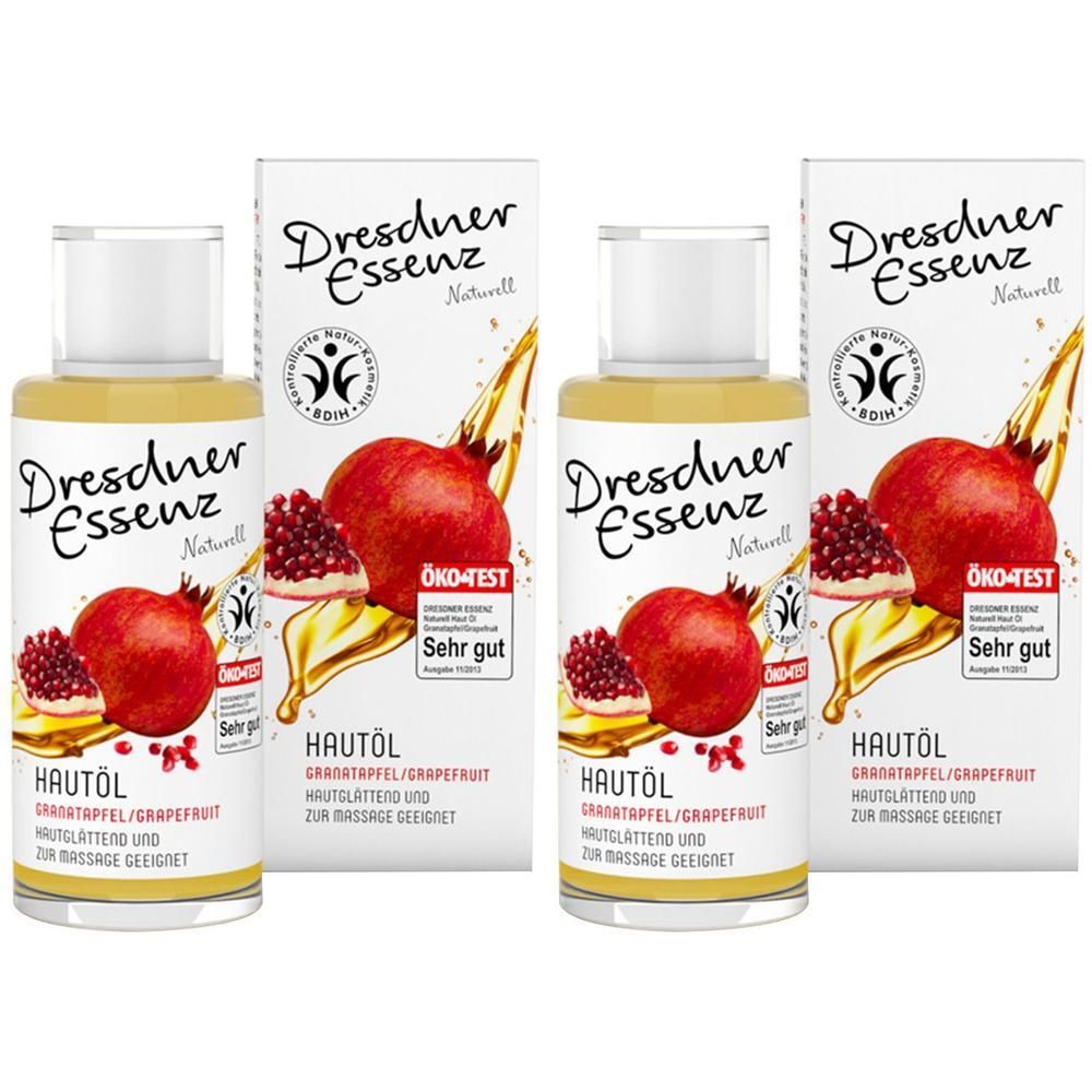 Zwei Flaschen Hautöl mit Kartonverpackung. Aufschrift: Dresdner Essenz, HAUTÖL, Granatapfel/Grapefruit. ÖKO-TEST Siegel.
